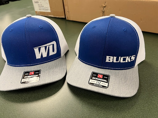 Two caps with custom embroidered logos