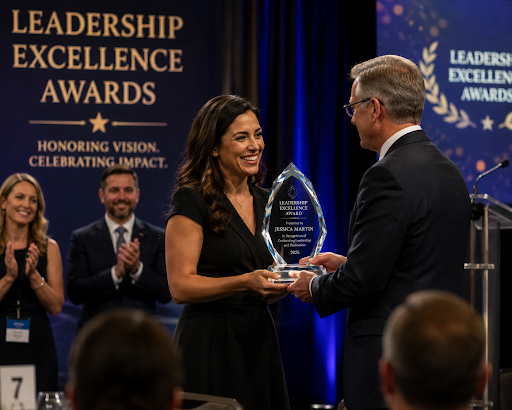 Person receiving a crystal award at awards ceremony